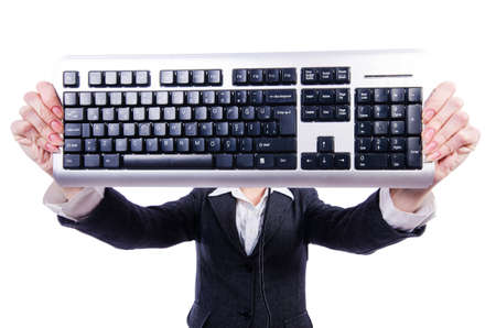 Nerd businessman with computer keyboard on whiteの写真素材