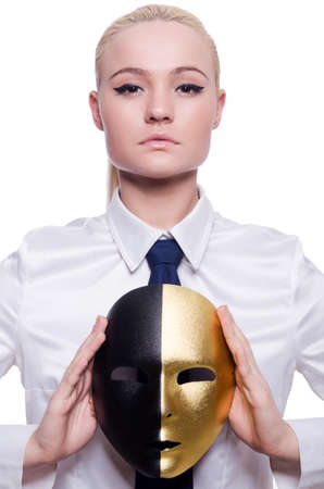 Woman with mask in hypocrisy conceptの写真素材