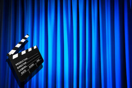 Movie clapper board against curtainの写真素材