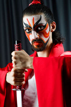 Man with sword and face maskの写真素材