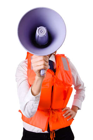 Young woman with vest and loudspeaker on whiteの写真素材