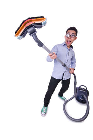 Funny man with vacuum cleaner on whiteの写真素材