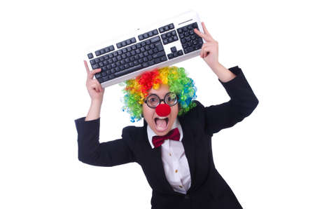 Funny clown with keyboard on whiteの写真素材