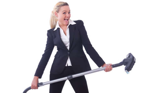 Businesswoman with vacuum cleaner on whiteの写真素材