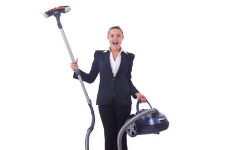 Businesswoman with vacuum cleaner on whiteの写真素材