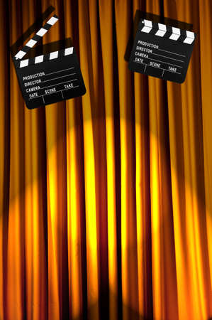 Movie clapper board against curtainの写真素材