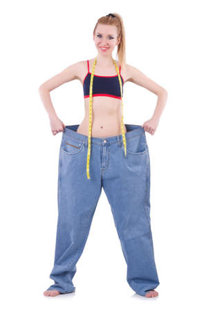 Dieting concept with oversize jeansの写真素材