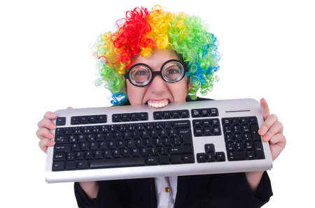 Funny clown with keyboard on whiteの写真素材