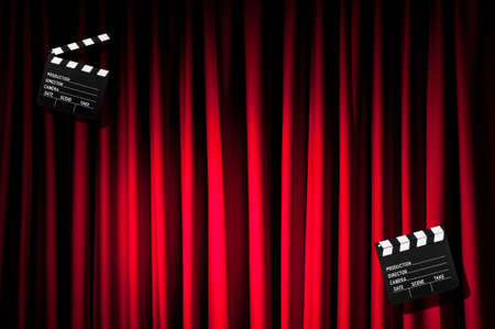 Movie clapper board against curtainの写真素材