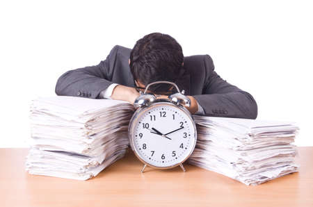 Woman businessman with giant alarm clockの写真素材