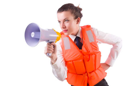 Young woman with vest and loudspeaker on whiteの写真素材