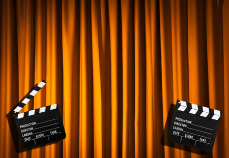 Movie clapper board against curtainの写真素材