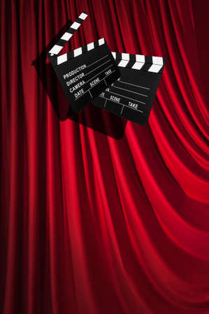Movie clapper board against curtainの写真素材
