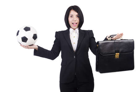 Businesswoman with ball on whiteの写真素材
