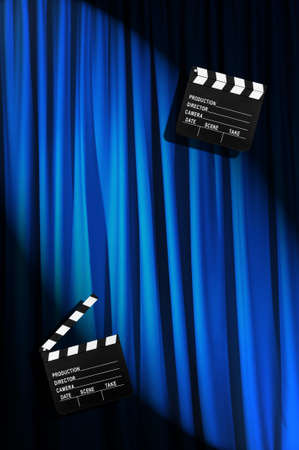 Movie clapper board against curtainの写真素材