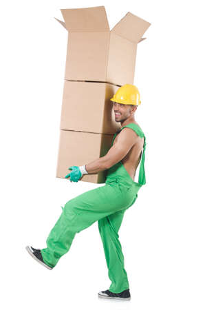 Man in green coveralls with boxesの写真素材