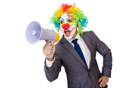 Businessman clown with loudspeaker on whiteの写真素材