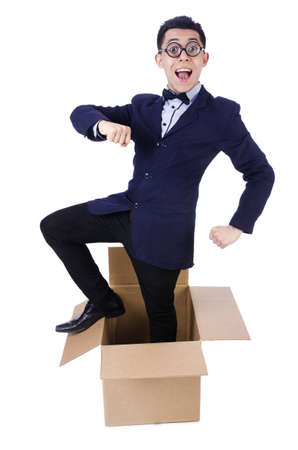 Businessman with box isolated on the whiteの写真素材