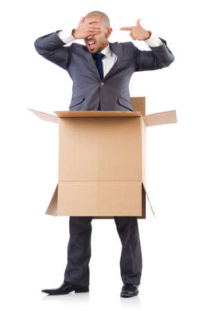 Businessman with box isolated on the whiteの写真素材