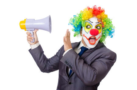 Businessman clown with loudspeaker on whiteの写真素材