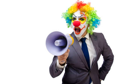 Businessman clown with loudspeaker on whiteの写真素材