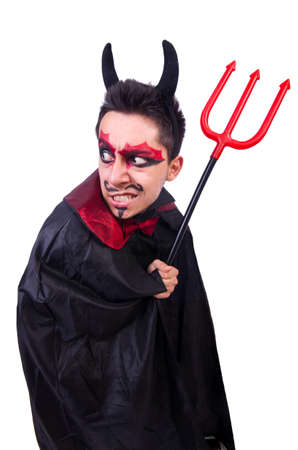 Man in devil costume in halloween conceptの写真素材