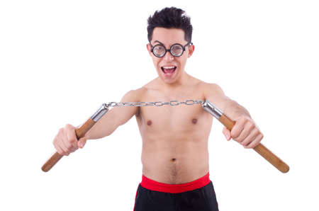 Funny guy with nunchucks on whiteの写真素材