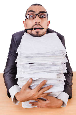 Man with too much work to doの写真素材