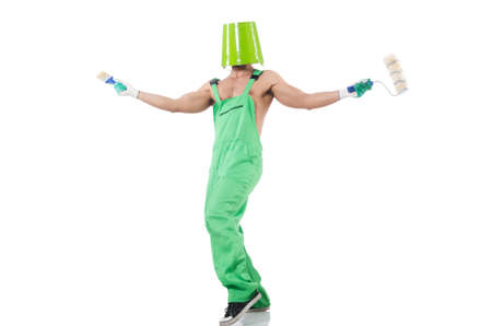 Painter in green coveralls on whiteの写真素材