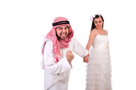 Arab man with his wife on whiteの写真素材