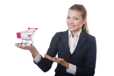 Businesswoman with shopping cart on whiteの写真素材