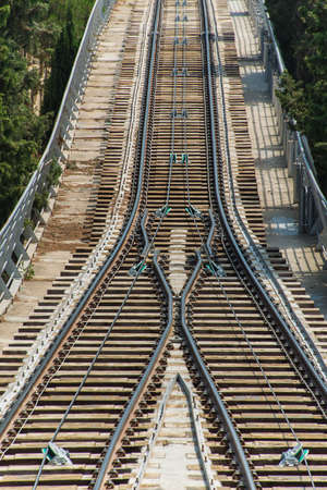 Rail tracks in bright summer dayの写真素材