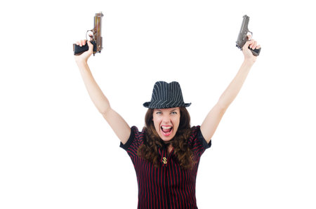 Young woman gangster with gun on whiteの写真素材
