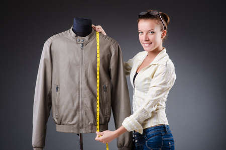 Woman tailor working on clothingの写真素材