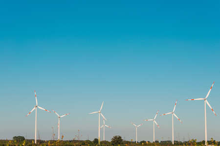Wind mills during bright summer dayの写真素材