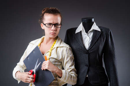 Woman tailor working on clothingの写真素材