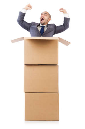 Businessman with box isolated on the whiteの写真素材