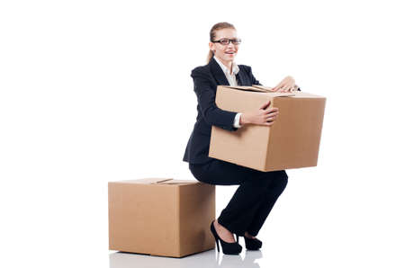 Woman businesswoman with boxes on whiteの写真素材