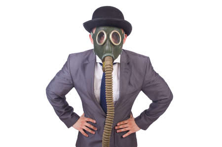 Businessman wearing gas mask isolated on whiteの写真素材