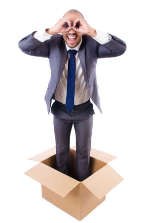Businessman with box isolated on the whiteの写真素材