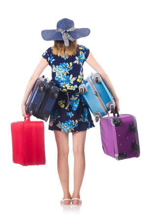Woman with suitcases isolated on whiteの写真素材