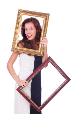 Woman with picture frame on whiteの写真素材