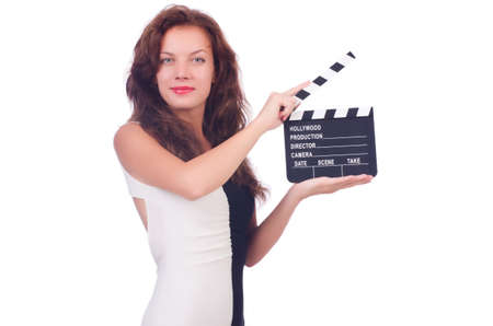 Woman with movie board isolated on whiteの写真素材