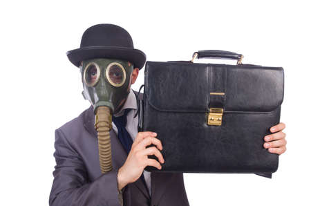 Businessman wearing gas mask isolated on whiteの写真素材