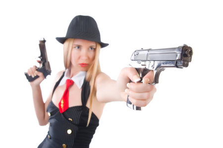 Woman with gun isolated on whiteの写真素材