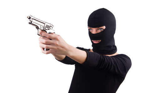 Burglar with handgun isolated on whiteの写真素材