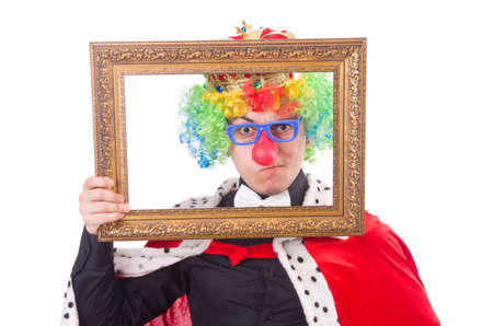 Businessman with crown isolated on whiteの写真素材