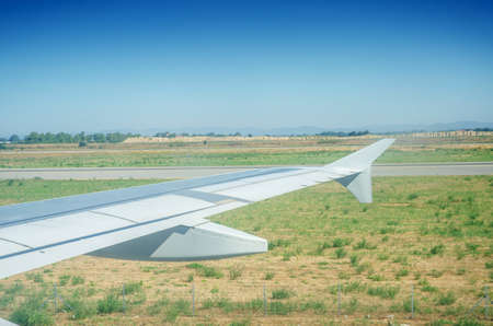 Airplane wing out of window