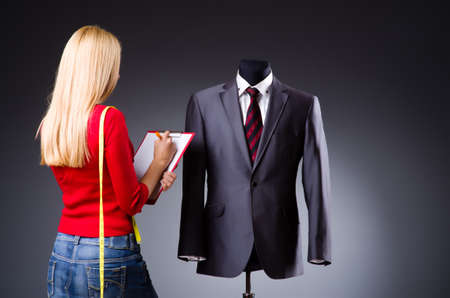 Young tailor isolated on the whiteの写真素材
