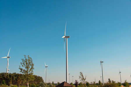 Wind mills during bright summer dayの写真素材
